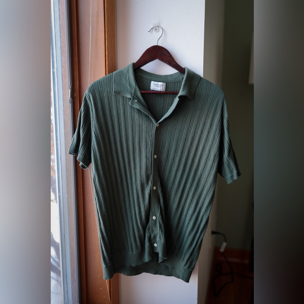 Green men’s sweater polo